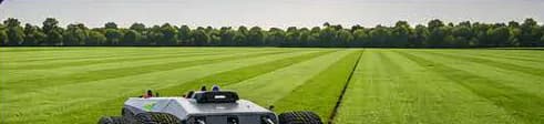 Pandag G1 mowing long rows at a turf farm